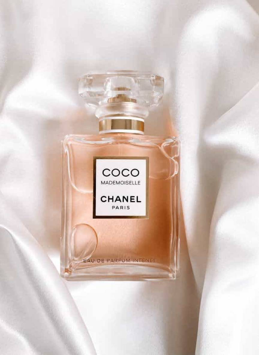 A watch photographed on a textured surface.